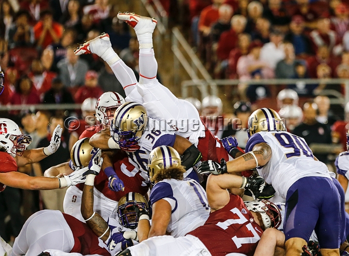 2015StanWash-041.JPG - Oct 24, 2015; Stanford, CA, USA; Stanford Cardinal running back Remound Wright (22) leaps for a first down in the first quarter against the Washington Huskies at Stanford Stadium. Stanford beat Washington 31-14.